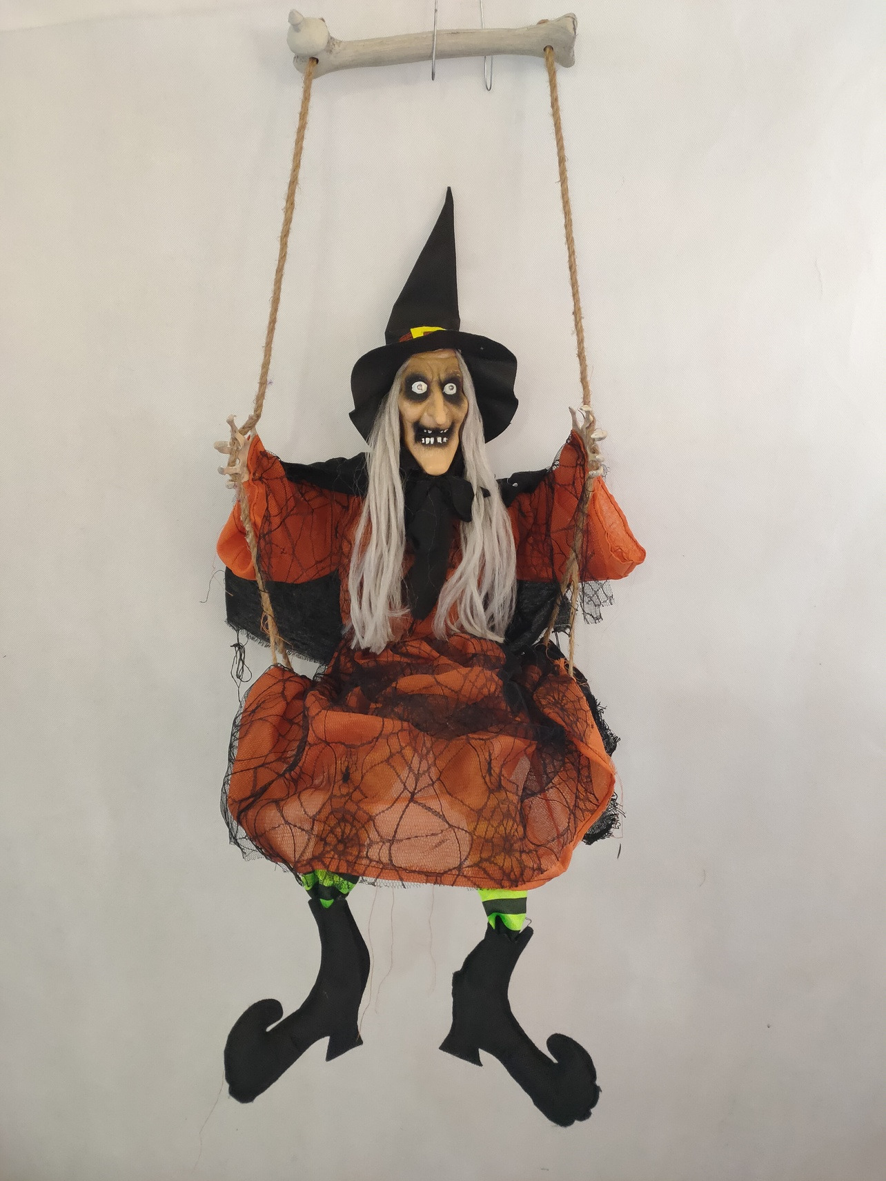 Swinging Witch with Animated Expressions and Glowing Effect